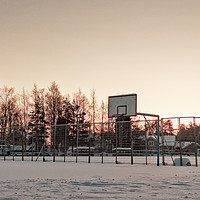 Buy canvas prints of Basketball Field Covered with Snow by Jukka Heinovirta
