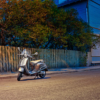 Buy canvas prints of Lonely Scooter By The Street by Jukka Heinovirta