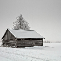 Buy canvas prints of Snow Covered Barn House By The Road by Jukka Heinovirta