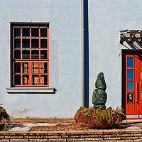 Buy canvas prints of Red Window And Door On A Blue Wall by Jukka Heinovirta