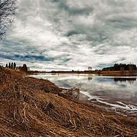 Buy canvas prints of Springtime Clouds Over The River by Jukka Heinovirta