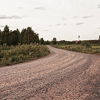 Buy canvas prints of Gravel Road To The Woods by Jukka Heinovirta