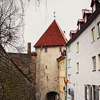 Buy canvas prints of Steep Downhill Alley In The Old Town of Tallinn by Jukka Heinovirta