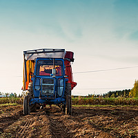 Buy canvas prints of Old Tractor On The Autumn Fields by Jukka Heinovirta