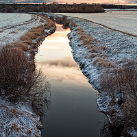Buy canvas prints of Sunrise Reflecting On The River Water by Jukka Heinovirta