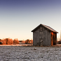 Buy canvas prints of Small Barn House In The Winter Sunrise by Jukka Heinovirta
