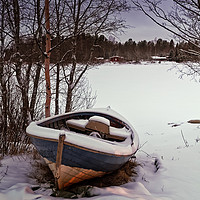 Buy canvas prints of Fishing Boat Under Snow by Jukka Heinovirta