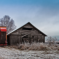 Buy canvas prints of Potato Harvester By An Old Barn by Jukka Heinovirta