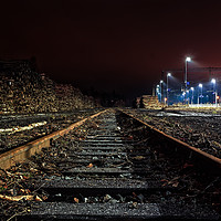 Buy canvas prints of Railroad Tracks To The Horizon by Jukka Heinovirta