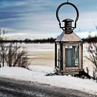 Buy canvas prints of Old Metal Lantern On A Winter Day by Jukka Heinovirta
