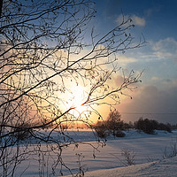 Buy canvas prints of Winter Sunset By The River by Jukka Heinovirta