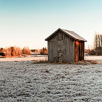 Buy canvas prints of Tiny Barn House On The Frosty Fields by Jukka Heinovirta