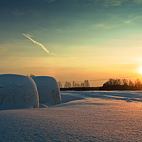 Buy canvas prints of Two Bales In The Winter Sunset by Jukka Heinovirta