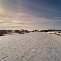 Buy canvas prints of Springtime Sun Over The River Ice by Jukka Heinovirta