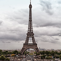 Buy canvas prints of Clouds Over The Eiffel Tower by Jukka Heinovirta