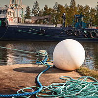Buy canvas prints of Old White Buoy On A Pier by Jukka Heinovirta