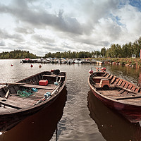 Buy canvas prints of Two Old Fishing Boats by Jukka Heinovirta