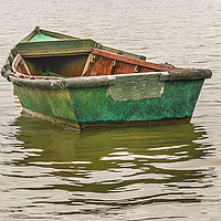 Buy canvas prints of Old Fishing Boat at Santa Lucia River in Montevide by Daniel Ferreira-Leite