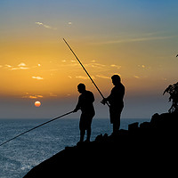 Buy canvas prints of Two Men Fishing at Shore by Daniel Ferreira-Leite