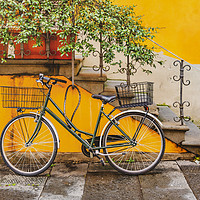 Buy canvas prints of Bicycle Parked at Wall, Lucca, Italy by Daniel Ferreira-Leite