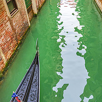 Buy canvas prints of Gondola Crossing Small Canal, Venice, Italy by Daniel Ferreira-Leite