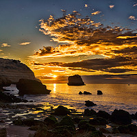 Buy canvas prints of Autumn Sunrise over Rocky Beach by Tony Purbrook