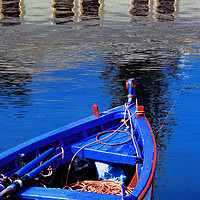 Buy canvas prints of Blue and red rowing boat by Tony Purbrook