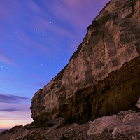 Buy canvas prints of Hunstanton cliffs under the stars  by Simon Blatch