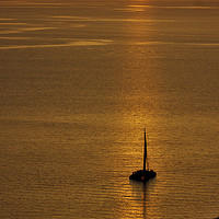Buy canvas prints of Boat in the Sunset at Oia by Jeremy Hayden