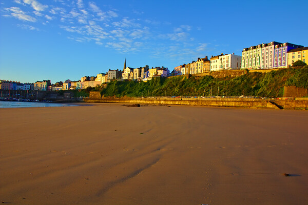 Tenby in the Sunrise from down on North Beach Picture Board by Jeremy Hayden