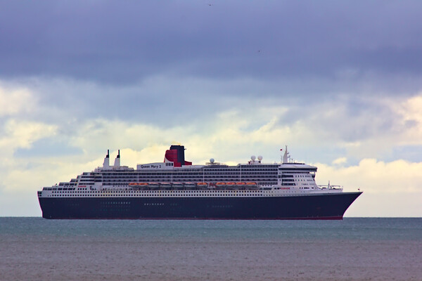 Queen Mary 2 off Teignmouth Picture Board by Jeremy Hayden