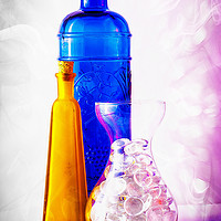 Buy canvas prints of Colourful jars and bottles with glass pebbles. by Paul Cullen