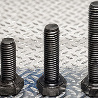 Buy canvas prints of Three metric bolts standing to attention. by Paul Cullen