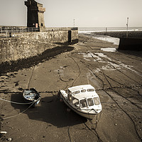 Buy canvas prints of Boats lying at Lynmouth - antique photo effect. by Paul Cullen