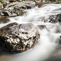 Buy canvas prints of Rocks in the stream - Abstract. by Paul Cullen