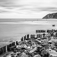 Buy canvas prints of Sea Defences at Lynmouth Devon. Monochrome. by Paul Cullen