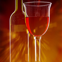 Buy canvas prints of Wine Glass and Bottle with Flare. by Paul Cullen