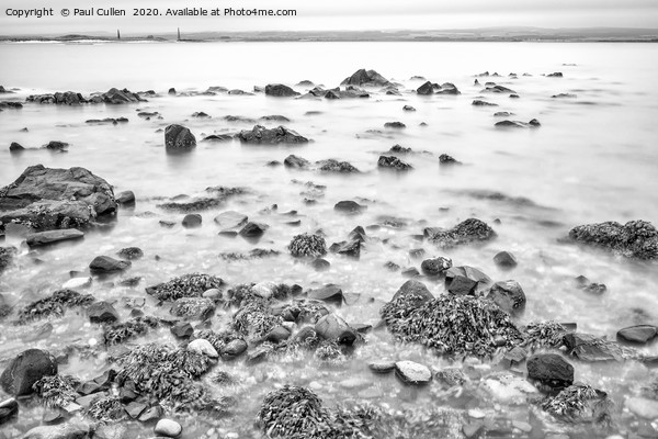 Rocks and Seaweed Uncovered at Lindisfarne - Mono Framed Print by Paul Cullen