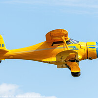 Buy canvas prints of Beech Staggerwing Biplane G-BRVE by Steve de Roeck
