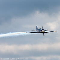 Buy canvas prints of Hawker Sea Fury Leaves A Trail Across A Darkening Sky by Steve de Roeck