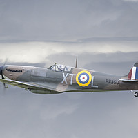 Buy canvas prints of Supermarine Spitfire Above The Clouds by Steve de Roeck