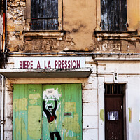 Buy canvas prints of Old Building, New Sign, Arles by Steve de Roeck