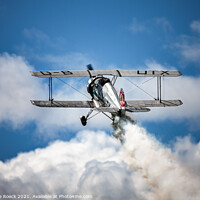 Buy canvas prints of Old Biplane pulls up over the clouds by Steve de Roeck