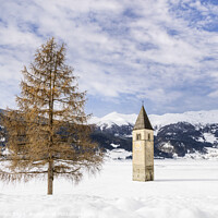 Buy canvas prints of Resia Lake with the sunken church tower in winter by Melanie Viola
