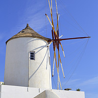 Buy canvas prints of A windmill in Santorini island, Greece by Aleksey Zaharinov