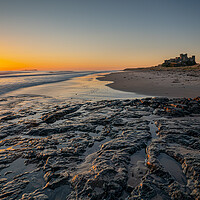 Buy canvas prints of Bamburgh Castle Sunrise by Michael Brookes