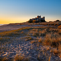 Buy canvas prints of Sunrise at Bamburgh castle, Northumberland by Michael Brookes