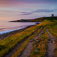 Buy canvas prints of Dunstanburgh Castle at dawn by Michael Brookes