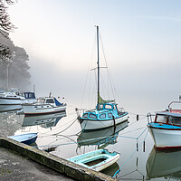 Buy canvas prints of Boats moored at Malpas village at dawn Cornwall UK.  by Michael Brookes