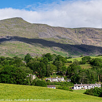 Buy canvas prints of Early morning light on the village of Coniston & the 'Old Man'  by George Robertson